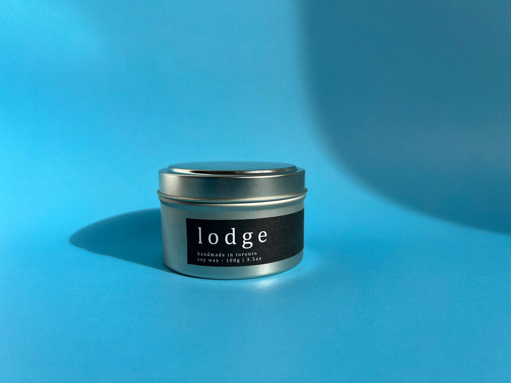 lodge - cognac, pine needles and sandalwood - travel tin